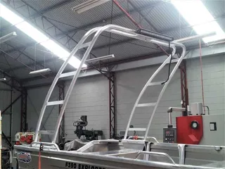 Fabricated metal canopy frame viewed from the front of a boat
