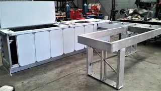 Outdoor kitchen and bench frames being assembled in the workshop